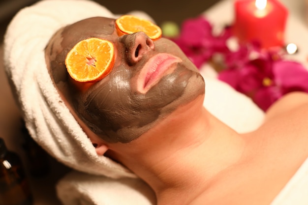 Woman undergo wellness course and face cleansing.