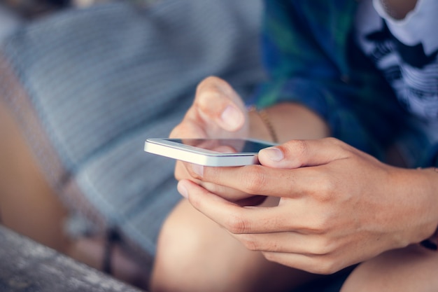 Woman use mobile phone in coffee shop