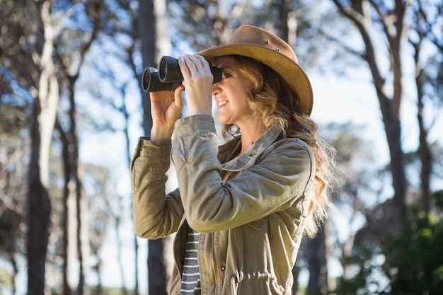 Woman using binoculars