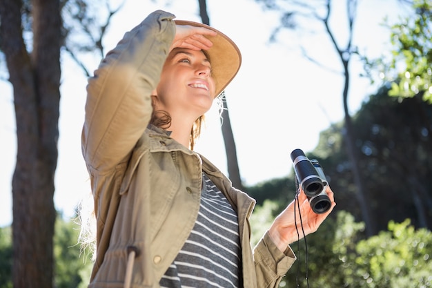 Woman using binoculars