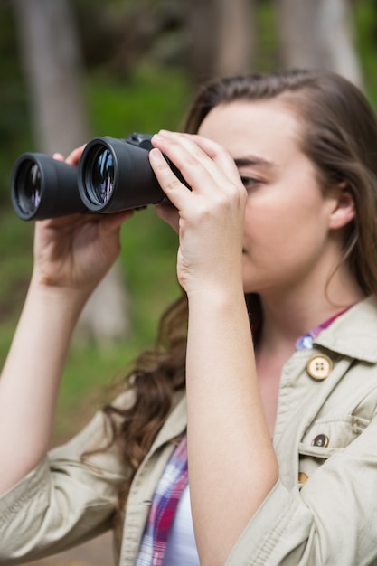 Woman using binoculars