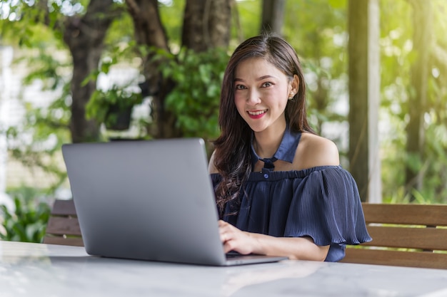 Woman using laptop computer