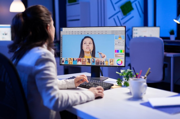 Woman using laptop on table