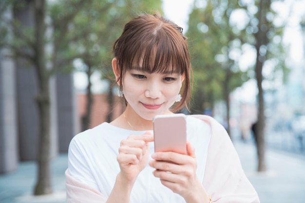 Woman using smartphone