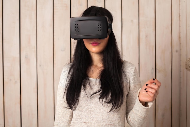 Photo woman in virtual reality helmet. vr glasses.