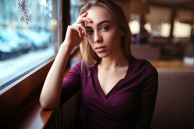 Woman waiting in coffee shop