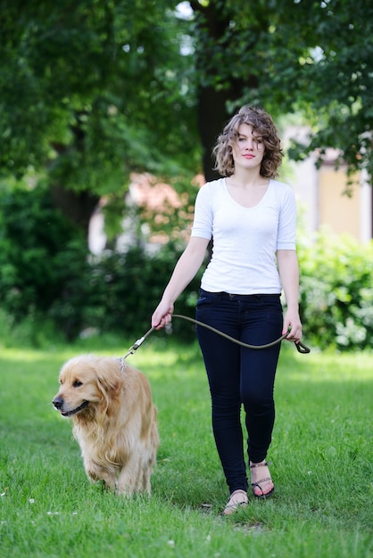 Woman walking a dog