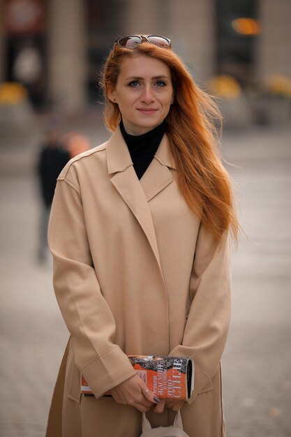 woman walking down the street. walk through the autumn city