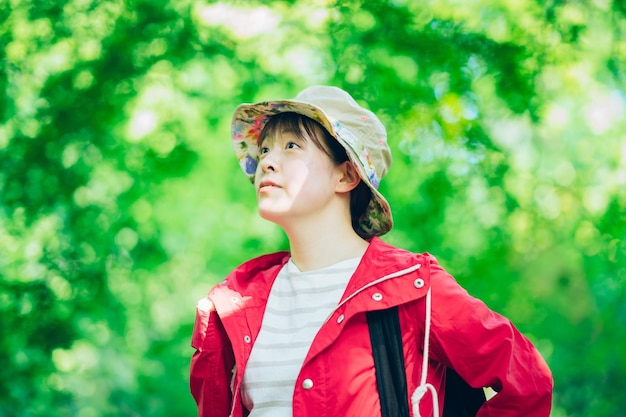 Woman walking in the fresh green mountain