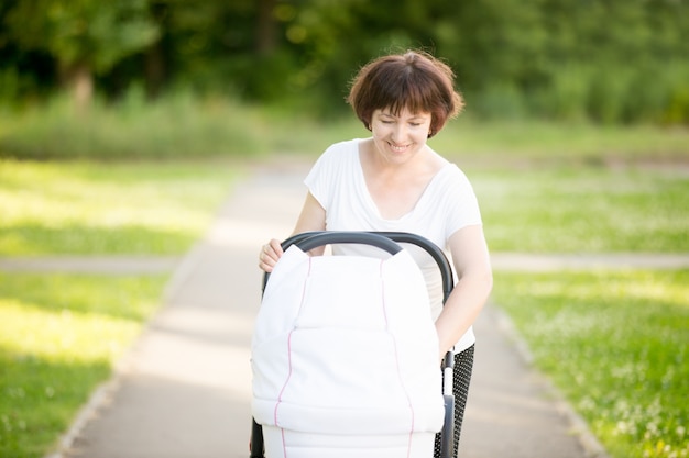 Woman walking a stroller