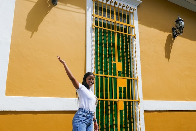 Woman walking through the streets of Barranquilla Colombia