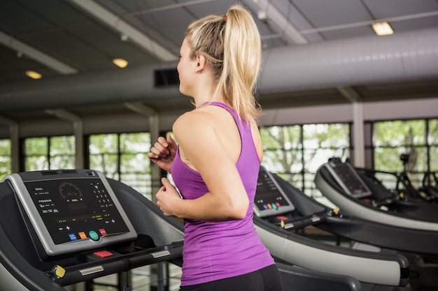 Woman walking on treadmill