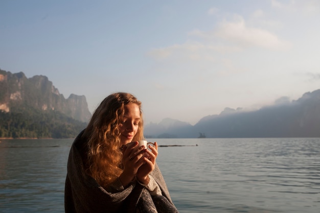 Woman warm in the morning sun