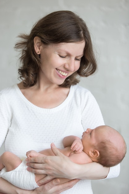 Woman watching her baby