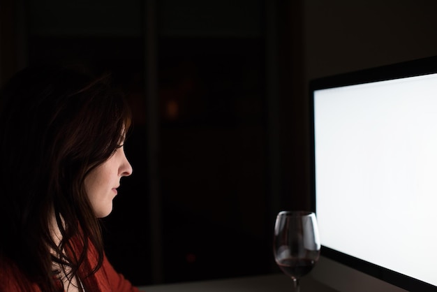 Woman watching online content on desktop