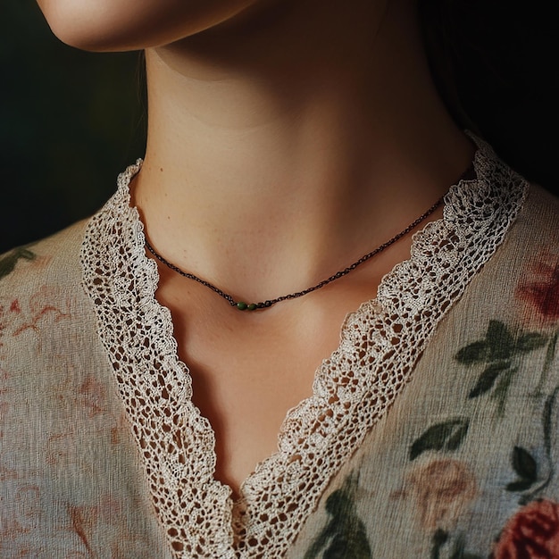 a woman wearing a black lace top with a black lace collar