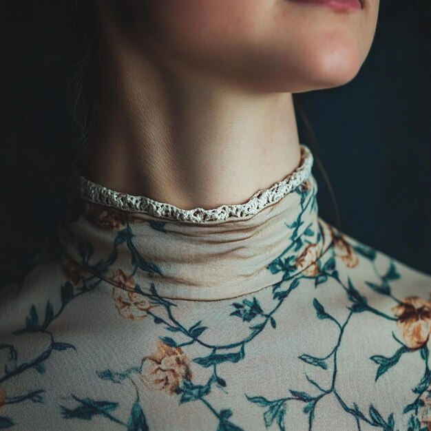 a woman wearing a black lace top with a black lace collar