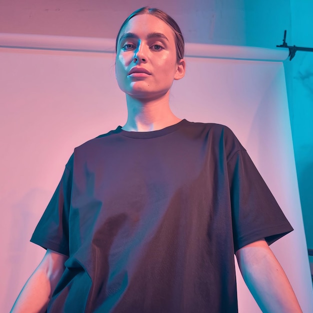 a woman wearing a black shirt with the word quot ana quot on it