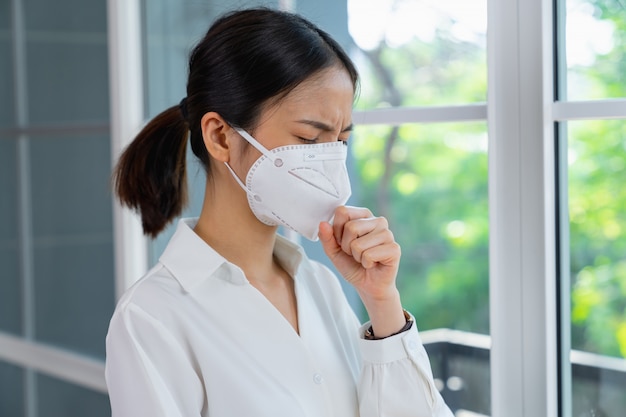 Woman wearing face mask protect from germs or viruses in the air.