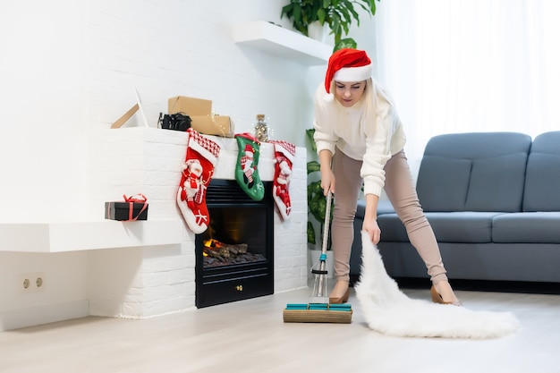 Woman wearing festive decorations ready for cleaning after Christmas