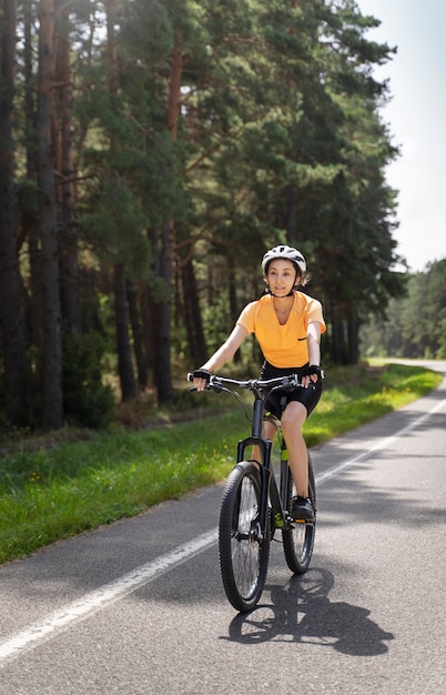 Woman wearing helmet full shot