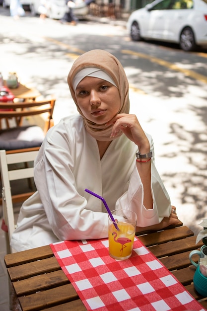 Woman wearing hijab high angle