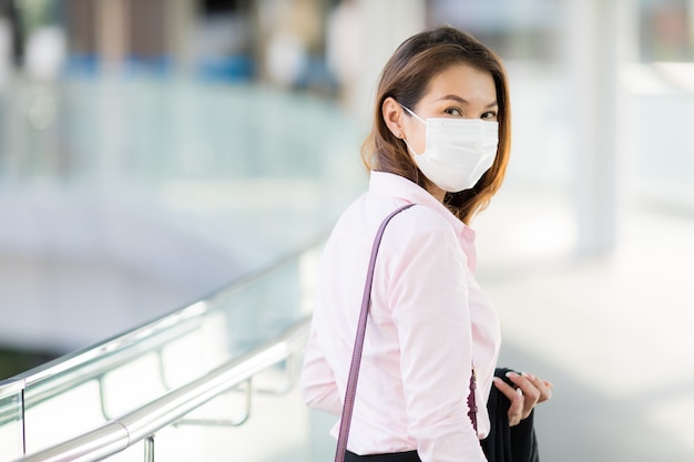 Woman wearing mask in walking.