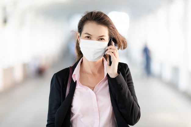 Woman wearing mask in walking.