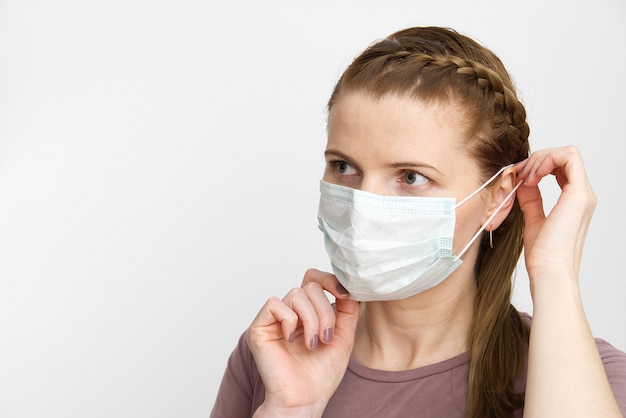 Woman wearing medical mask.