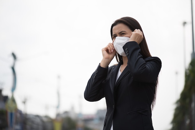 Woman wearing Protective face mask and cough, Coronavirus and pm 2.5 fighting