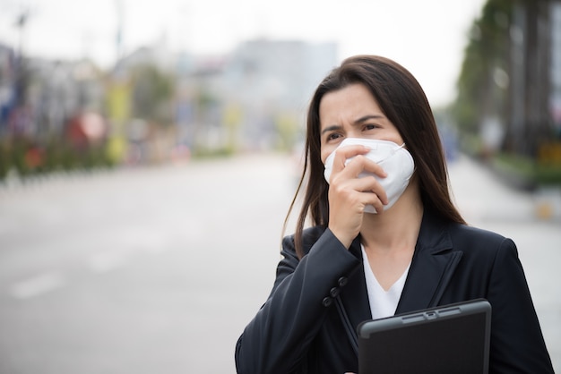 Woman wearing Protective face mask and cough, Coronavirus and pm 2.5 fighting