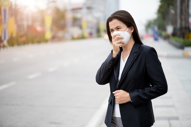 Woman wearing Protective face mask and cough, Coronavirus and pm 2.5 fighting