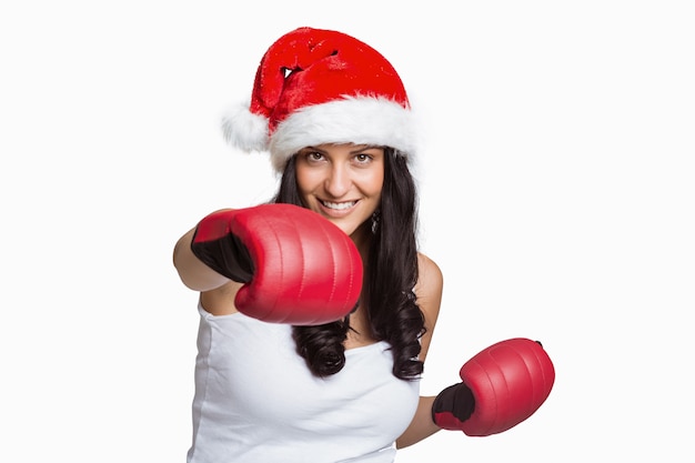 Woman wearing red boxing gloves