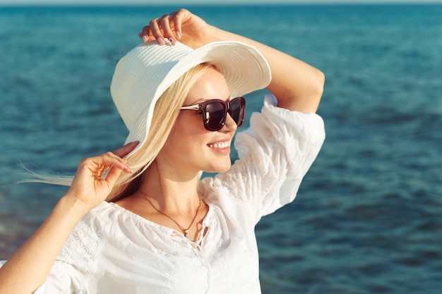 Woman wearing a straw hat