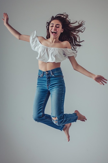 a woman wearing a white top that says quot shes jumping quot