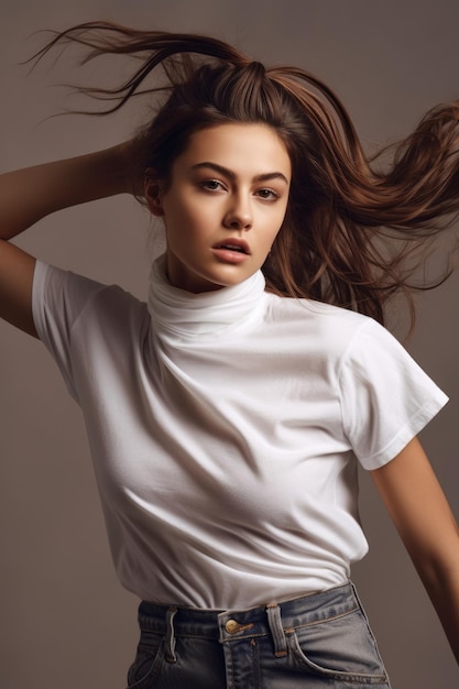 A woman in a white shirt is posing with her hair in a ponytail.