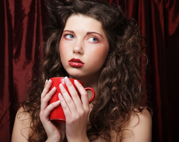 Woman with an aromatic coffee