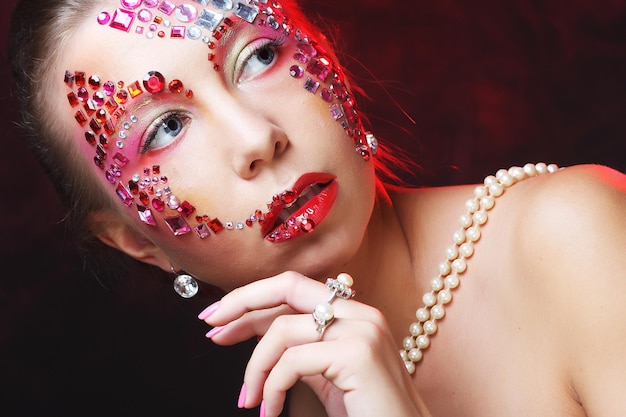 Woman with artistic makeup Luxury image