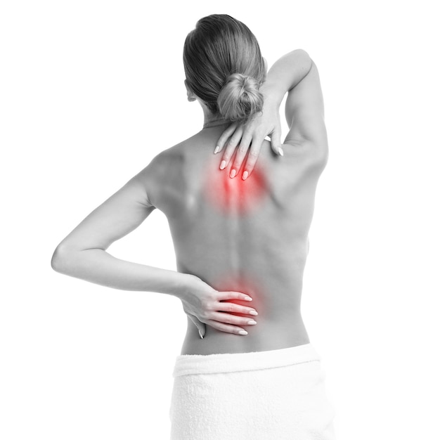 woman with backache over white background