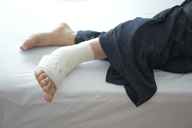 Woman with bandaged foot close up