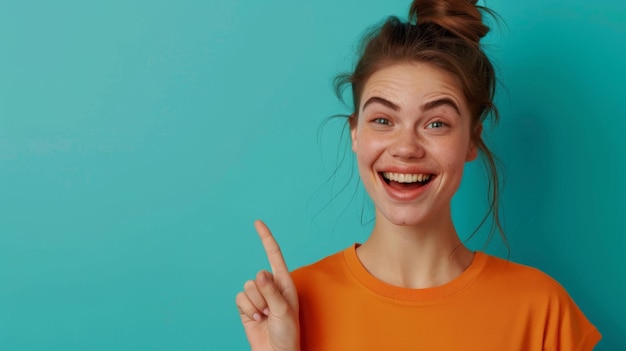 a woman with a big smile showing her index finger