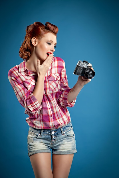 A woman with a camera that says'i'm not a photographer '