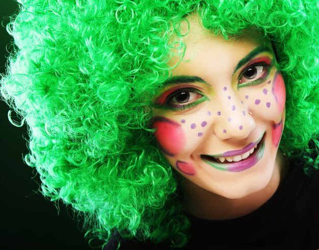 woman with clown wig and make up