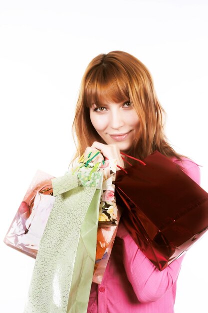 Woman with colorful shopping bags in her hand