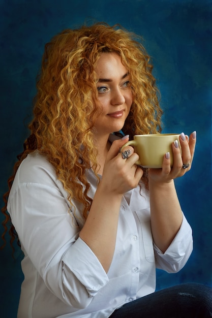 Woman with cup of coffee