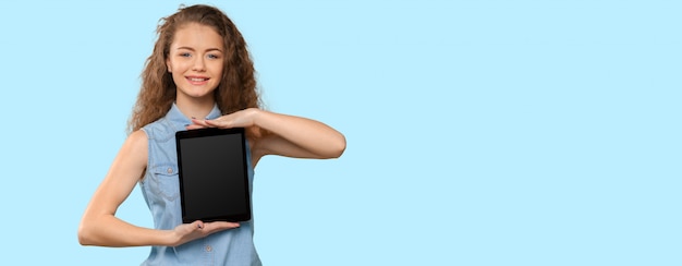 Woman with digital tablet