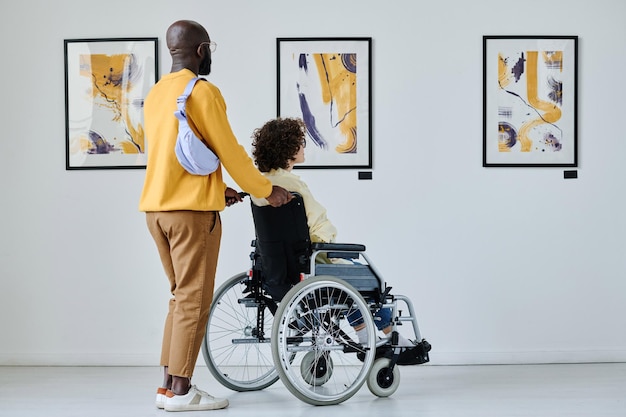 Woman with disability visiting art gallery