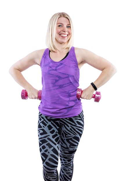 Woman with dumbbells Pretty smiling blonde activity and energy Isolated on white background Vertical