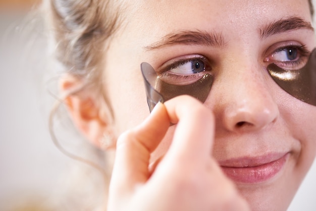 Woman with eye patches