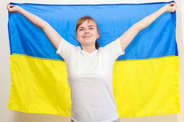 A woman with the flag of Ukraine closeup